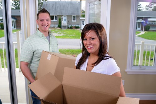 Local removals crew loading items from a family home in Kingston